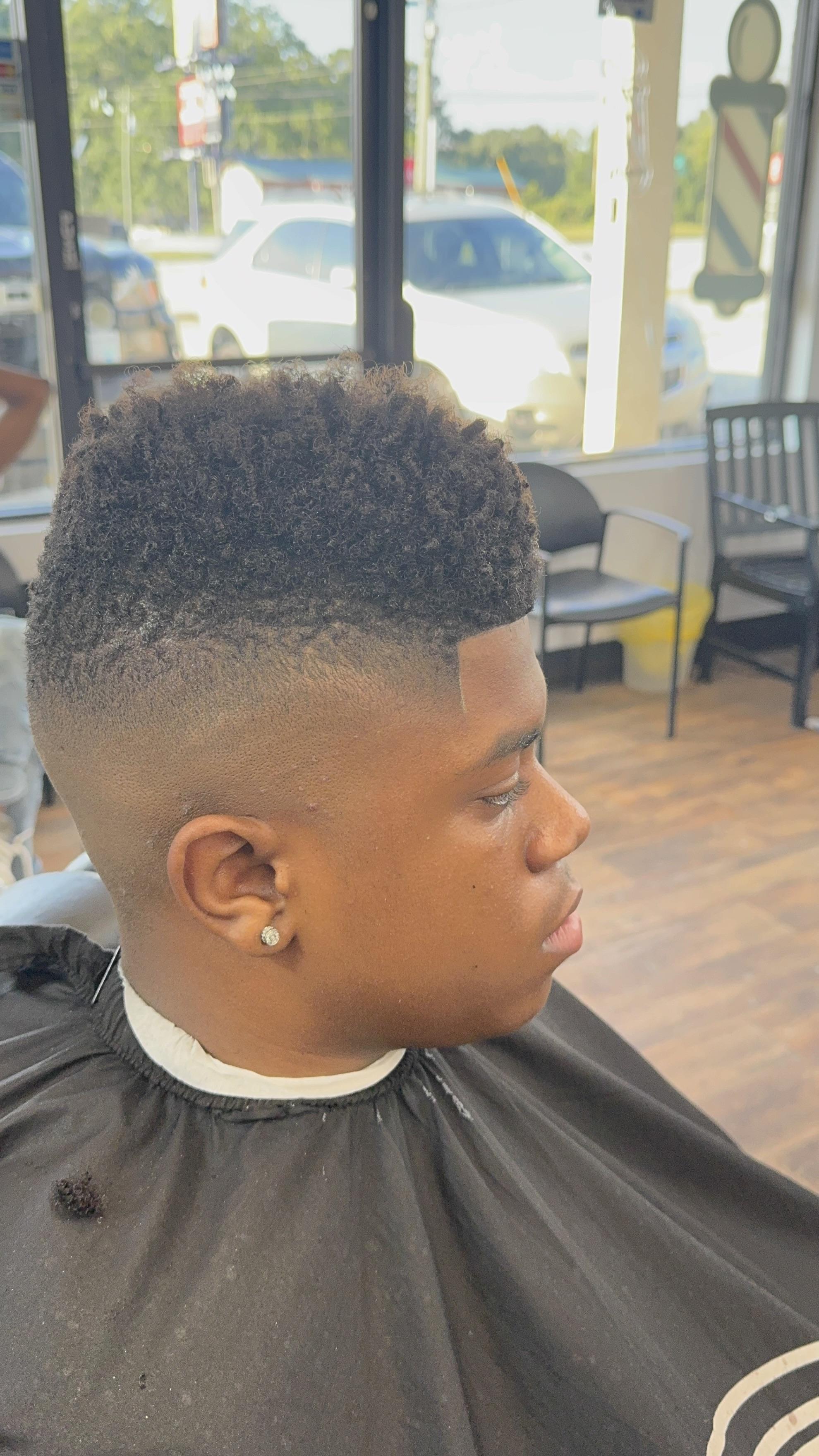 Client high top fade with clean side blend